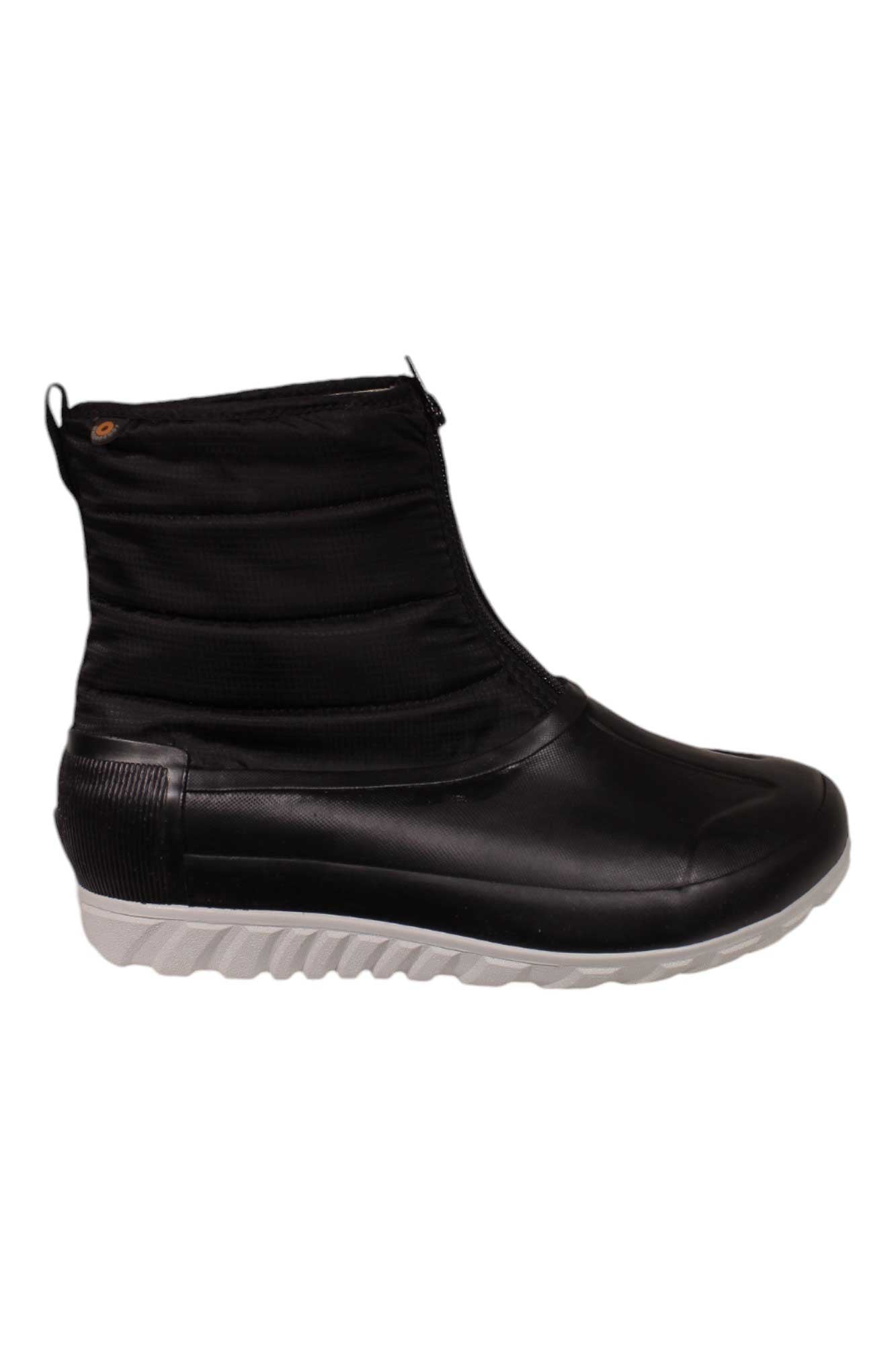 The Bogs Women's Classic Casual Winter Zip Boot is a black, eco-friendly ankle-height winter boot featuring a front zipper and a thick, textured white sole.