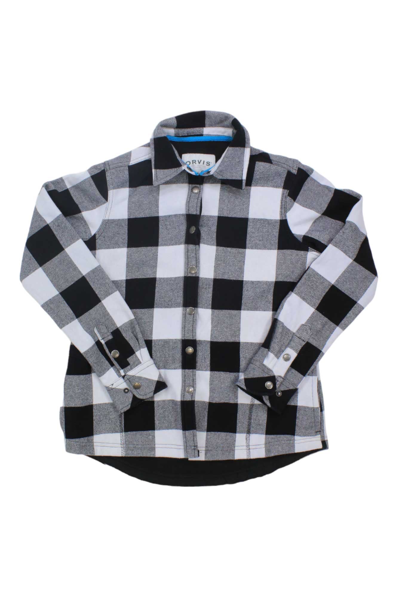 The Womens Fleeced Lined Flannel Pinnacle Shirt Jacket features a long-sleeve, button-up design in a classic black and white buffalo check plaid, displayed flat with sleeves crossed at the wrists.