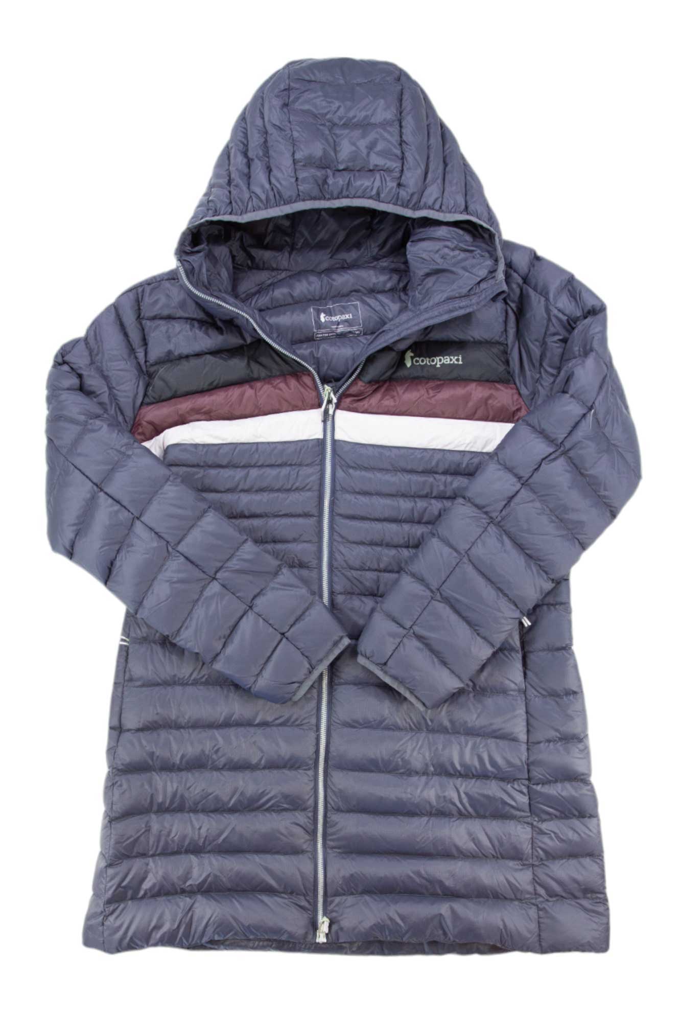 The Cotopaxi Womens Fuego Down Parka is a long, quilted gray down coat with a front zipper and maroon, white, and black stripes across the chest—perfect for staying warm outdoors in cold weather.