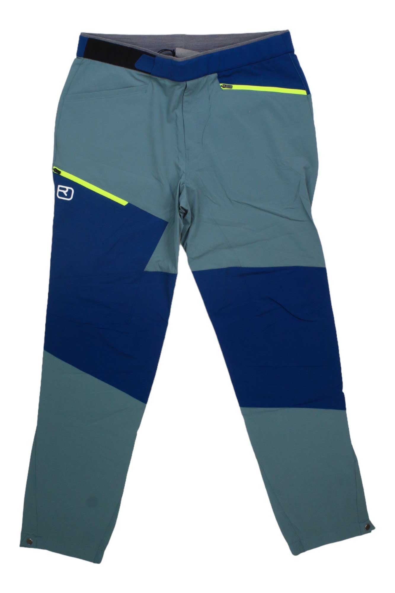 Men's light blue ski pants with dark panels, neon stripe, and zip fly
