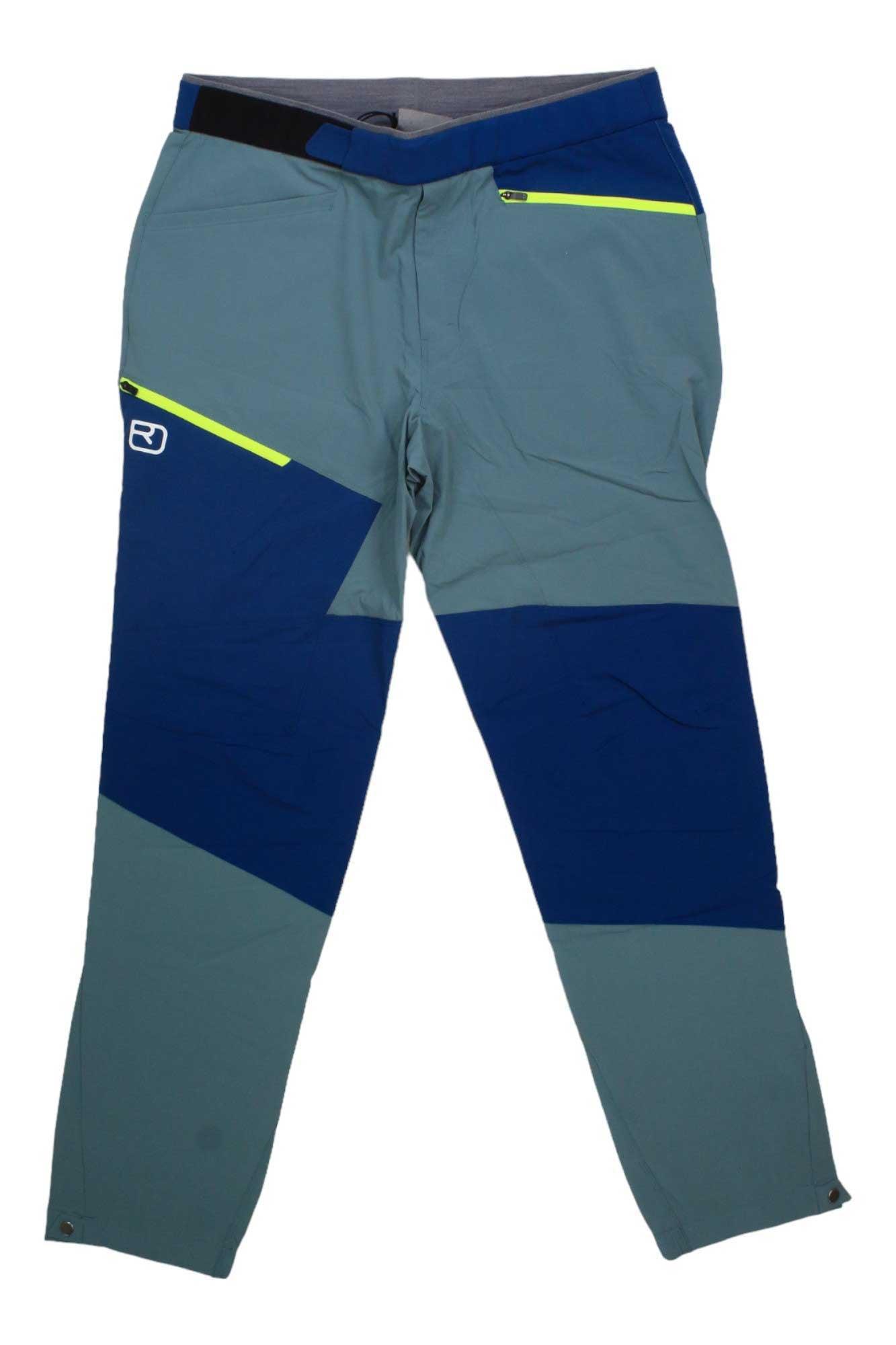 Men's light blue ski pants with dark blue panels, neon stripe, zip fly