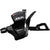 The Shimano SLX SL-M7000 Shift Lever is black with an ergonomic thumb lever, visible gear display, mounting bracket, and features white Shimano and SLX logos. This lightweight component is designed for smooth and efficient shifting.