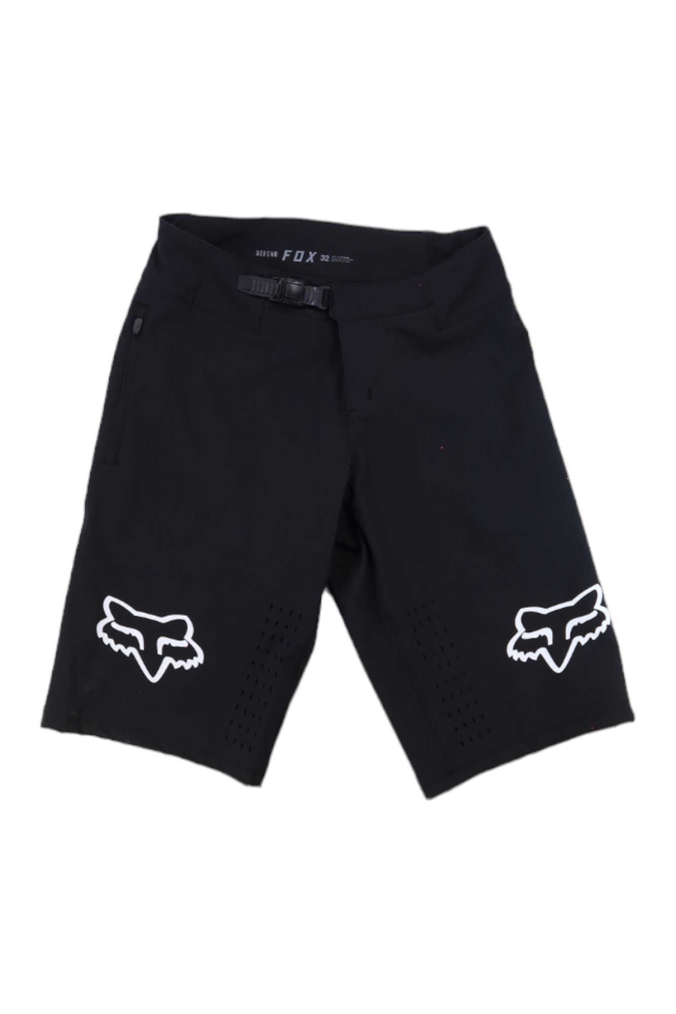 The Fox Mens Defend Short features durable stretch fabric, white fox head logos, a right-side zip pocket, adjustable waistband, and ventilation holes—ideal men’s cycling shorts for intense rides.