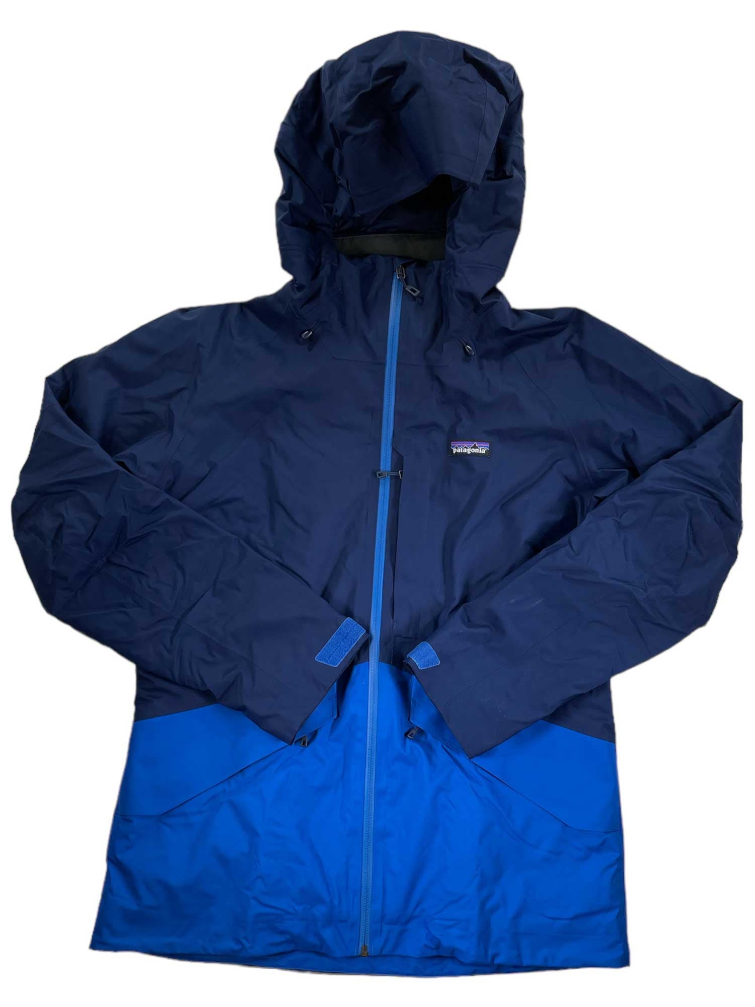 The Women's Snowbelle Insulated Jacket by Patagonia is a dark blue waterproof snowboard jacket with lighter blue accents, a front zipper, and a small chest logo.