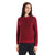 A woman with straight dark hair wears the Icebreaker Women's Waypoint Crewe Sweater in red and black stripes with dark pants, standing against a plain white background while looking to her left.
