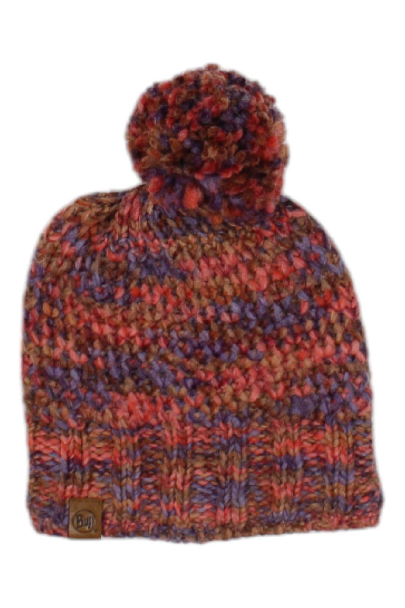 The Margo Knit Hat is a unisex beanie with a vibrant brown, red, and purple pattern, topped with a pom-pom and finished with a patch label near the brim—ideal for outdoor adventures.