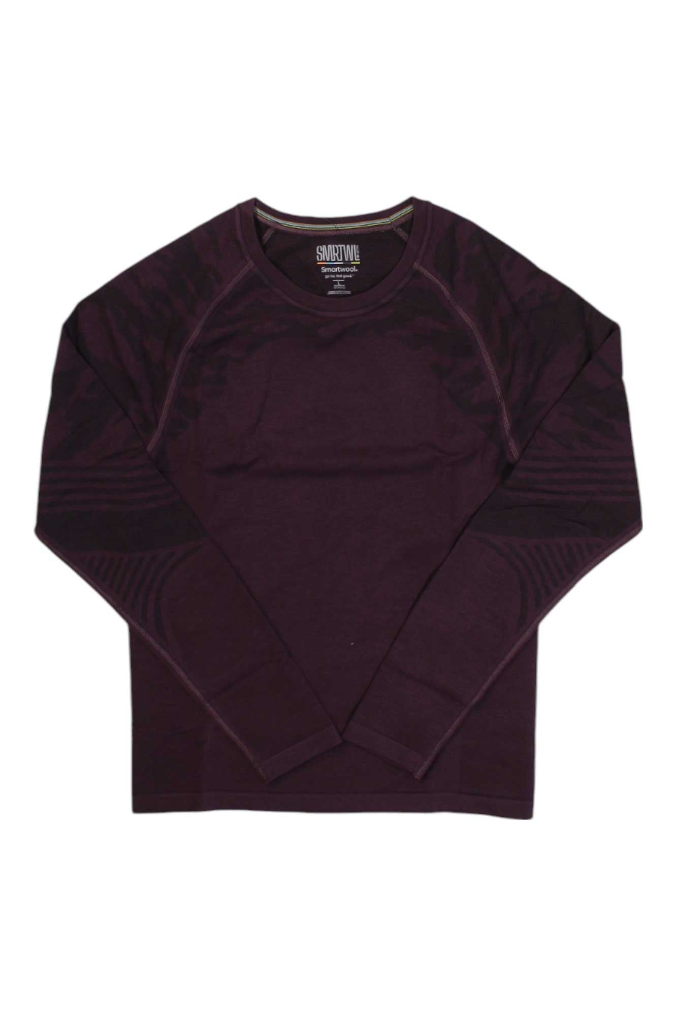 The Smartwool Mens Intraknit Active LS Base Layer Top is a long-sleeve, dark purple crew neck shirt with subtle patterns on the shoulders and sleeves, shown flat on a white background—perfect for active comfort in merino wool.