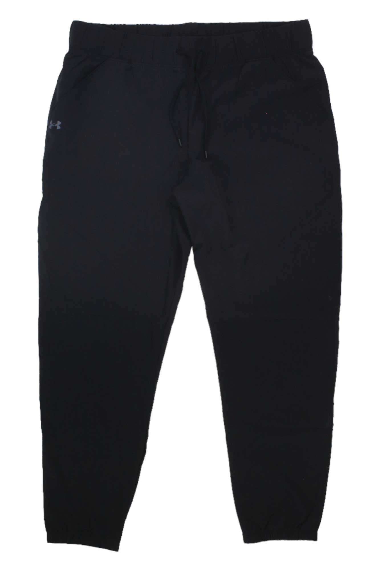 The Under Armour Women's UA Fusion Pant is a black hiking pant with an elastic waistband, drawstring, cuffed ankles, and logo on the upper left thigh. Water-resistant and perfect for outdoor adventures.