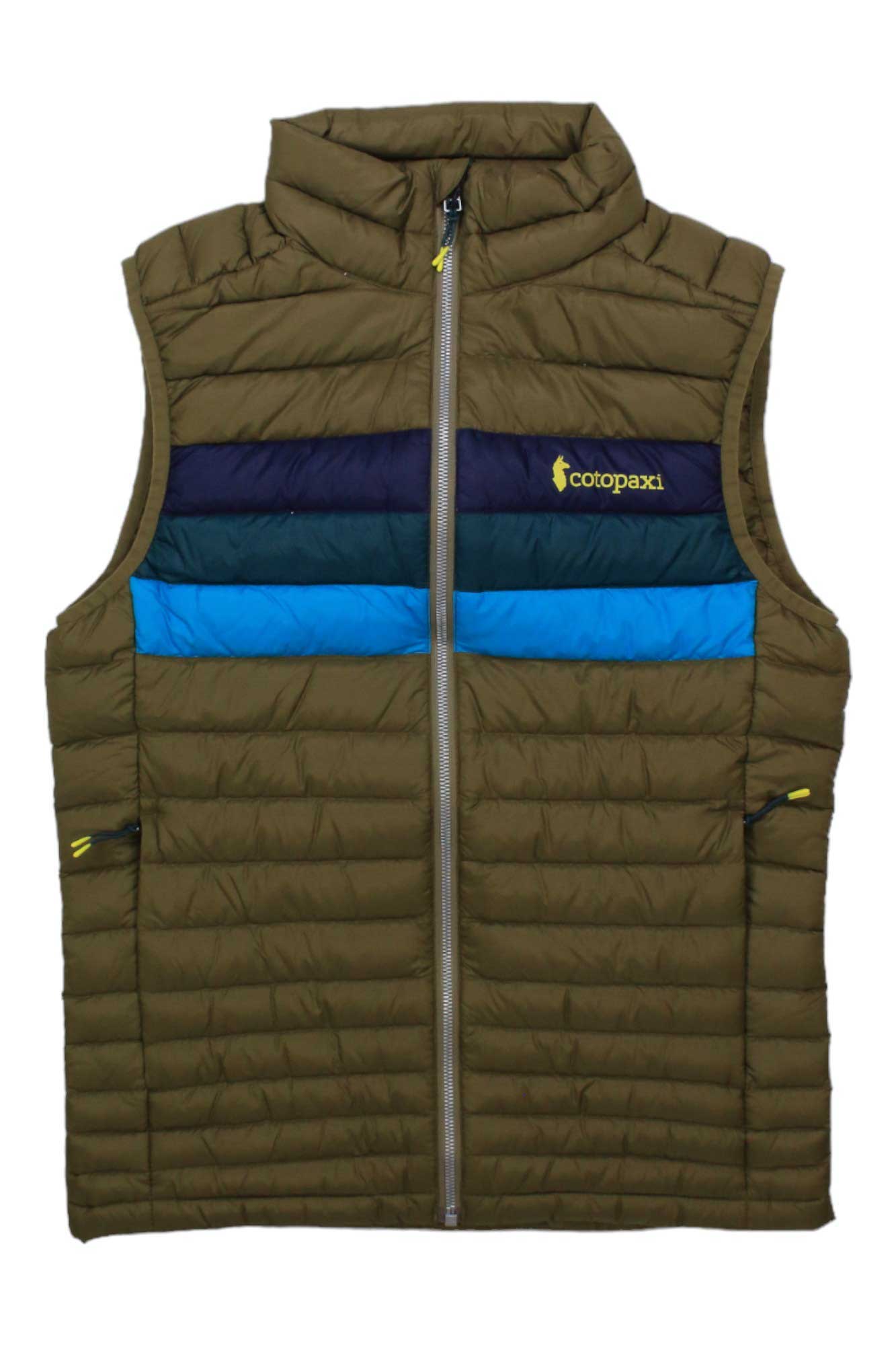 The Cotopaxi Mens Fuego Down Vest is a puffy, sleeveless olive green vest with blue, green, and navy stripes on the chest. It features water-resistant down, a front zipper, zippered side pockets, and a yellow Cotopaxi logo on the left chest.