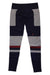 The Cotopaxi Womens Debajo Seamless Baselayer Tight features navy blue leggings with light gray panels, horizontal stripes, and a thin red knee stripe. Made from recycled materials, they have a small orange logo on the left thigh and are shown flat on a white background.