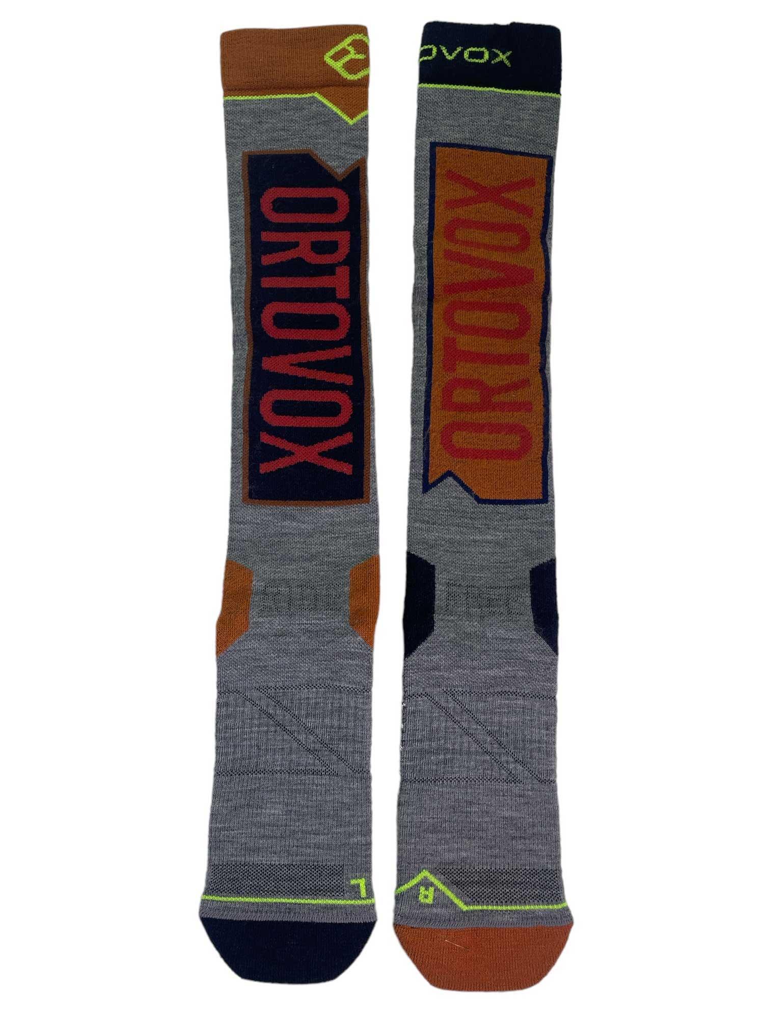 Men's freeride long socks, grey knit with orange and navy panels and bold ORTOVOX lettering