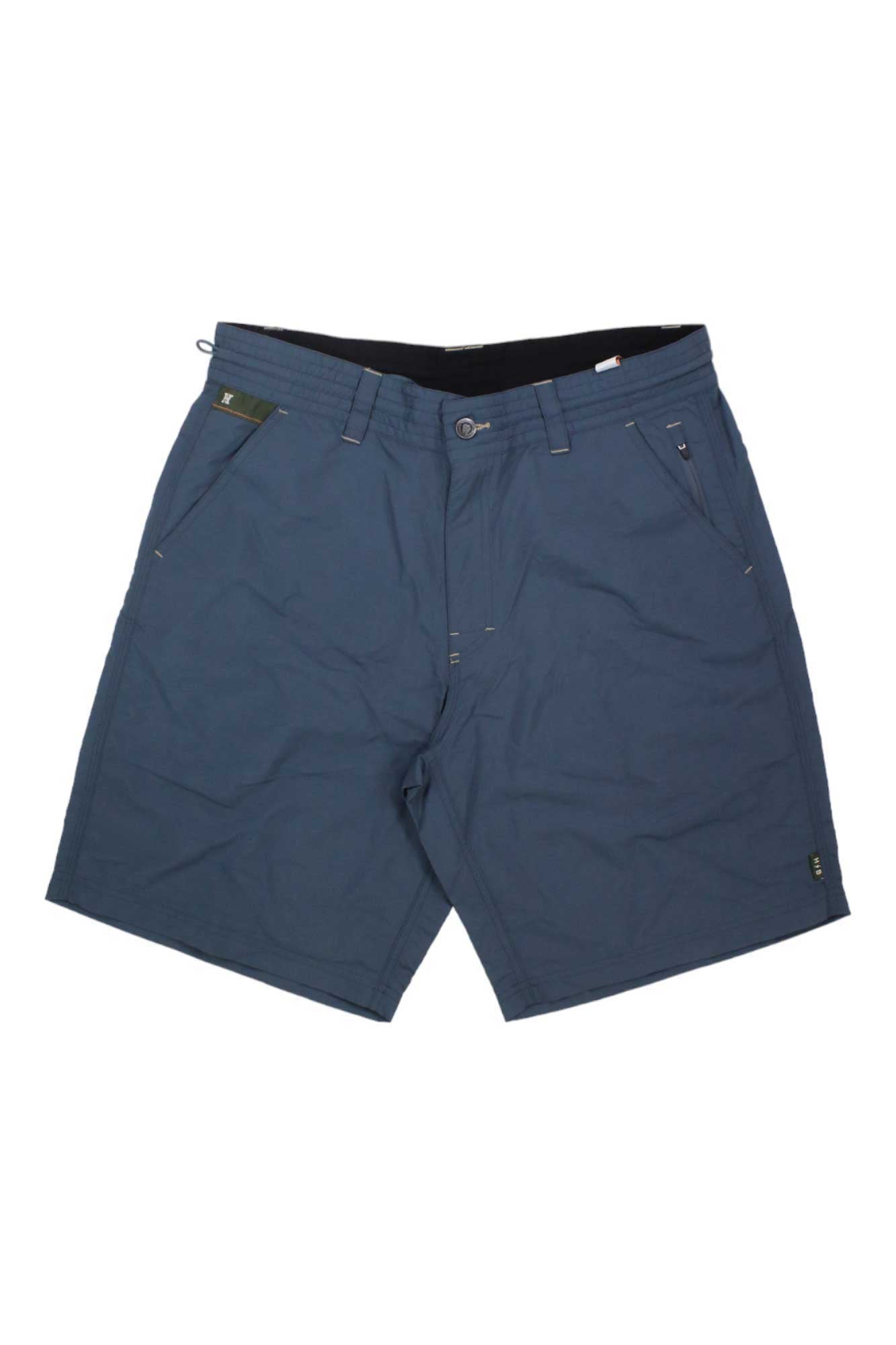 The Howler Brothers Mens Horizon Hybrid 2.0 Short is a pair of quick-drying blue knee-length shorts with belt loops, front pockets, and a button closure, shown laid flat on a white background.