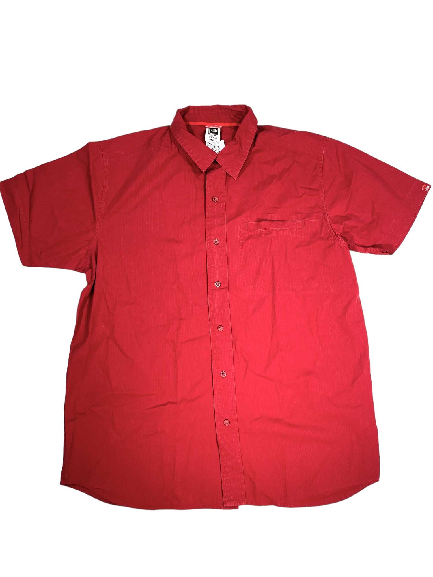 Men's red short-sleeve button-up shirt with pointed collar and front button placket