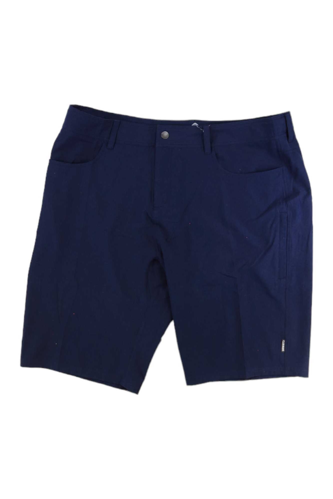 Club Ride Men's MTN Surf 12 Inch Short in navy blue, featuring front pockets, button and zipper fly. Laid flat on a white background. Water-resistant, comfortable fit—perfect for biking adventures.