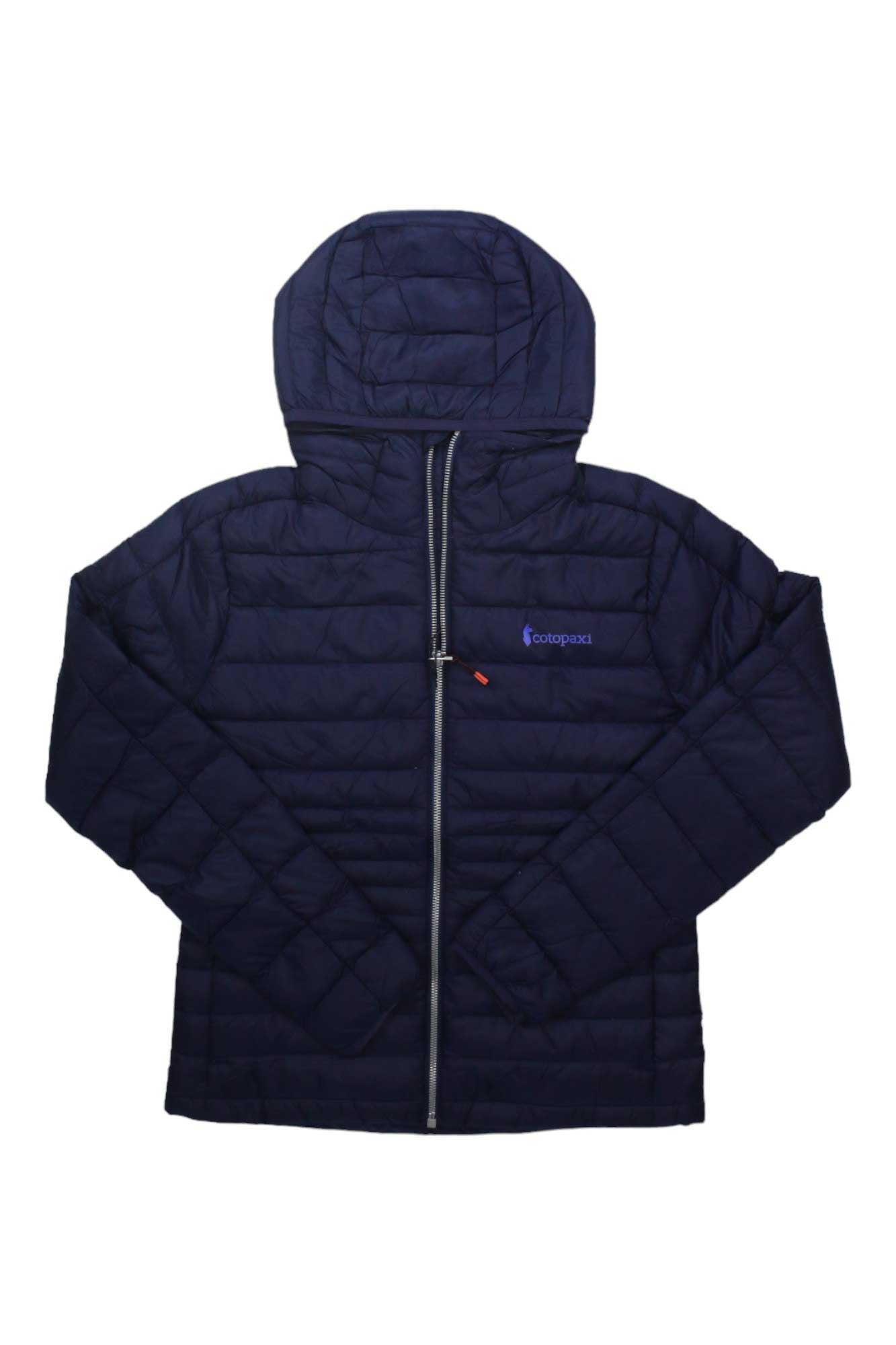 The Cotopaxi Women's Fuego Down Hooded Jacket in navy blue features lightweight insulation, horizontal quilting, a hood, front zipper, zippered chest pocket with logo, and responsibly-sourced down. Shown laid flat on a white background.