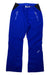 The Spyder Womens Winner Pant features bright blue color with black accents, two zippered front pockets, a small Spyder logo near the left knee, waterproof fabric, belt loops, and an inner brand tag.