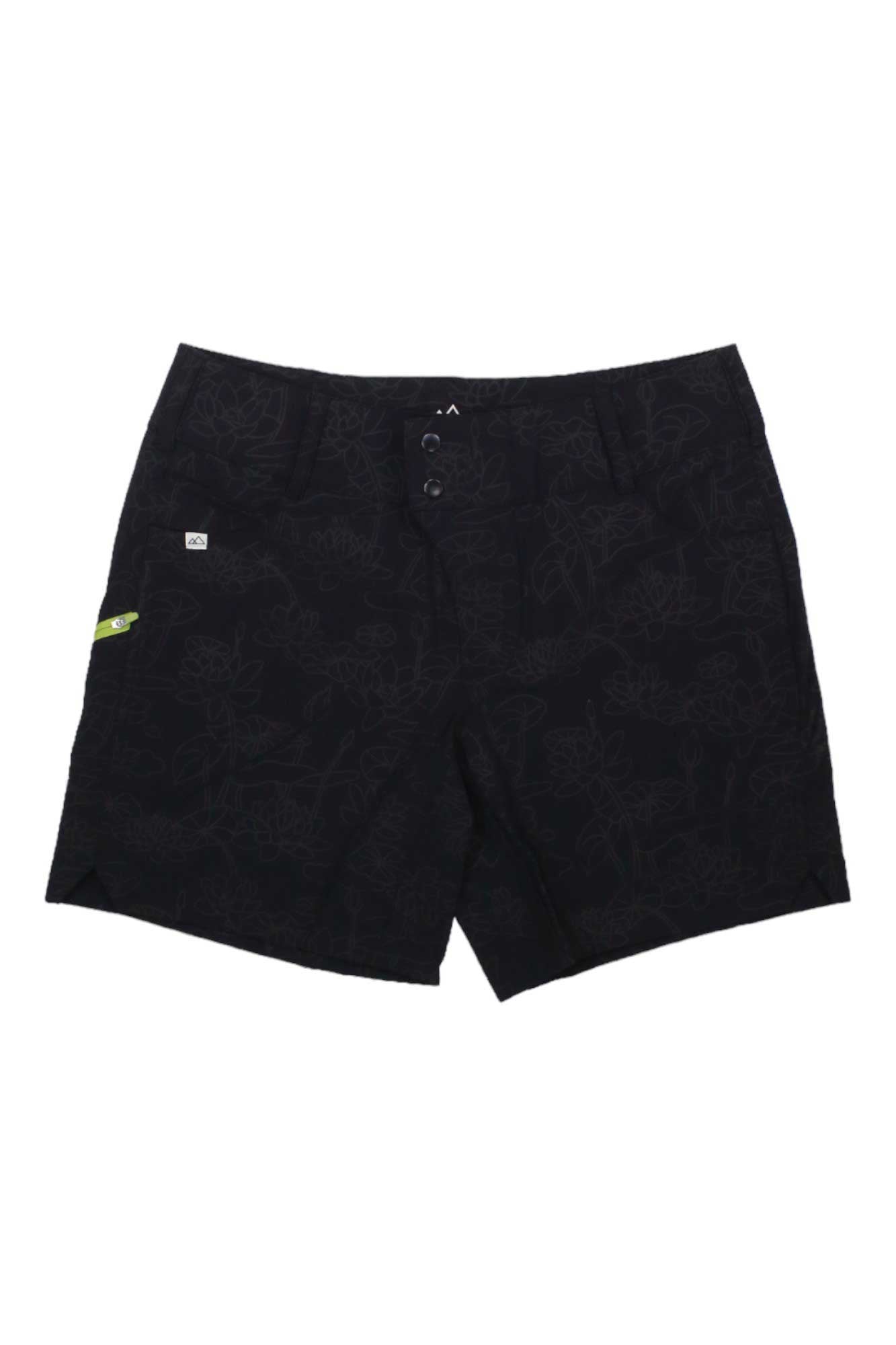 Wild Rye Womens Freda 7 Inch Short: Black, abrasion-resistant shorts with a subtle floral pattern, front button and zipper closure, and a small green tag on the left pocket.