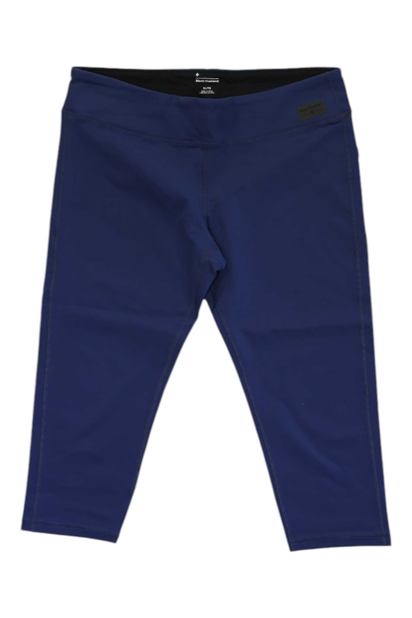 The Black Diamond Womens Levitation Capri—navy blue, knee-length leggings with a wide waistband and moisture-wicking fabric—are perfect for active days. Shown laid flat on a white background.