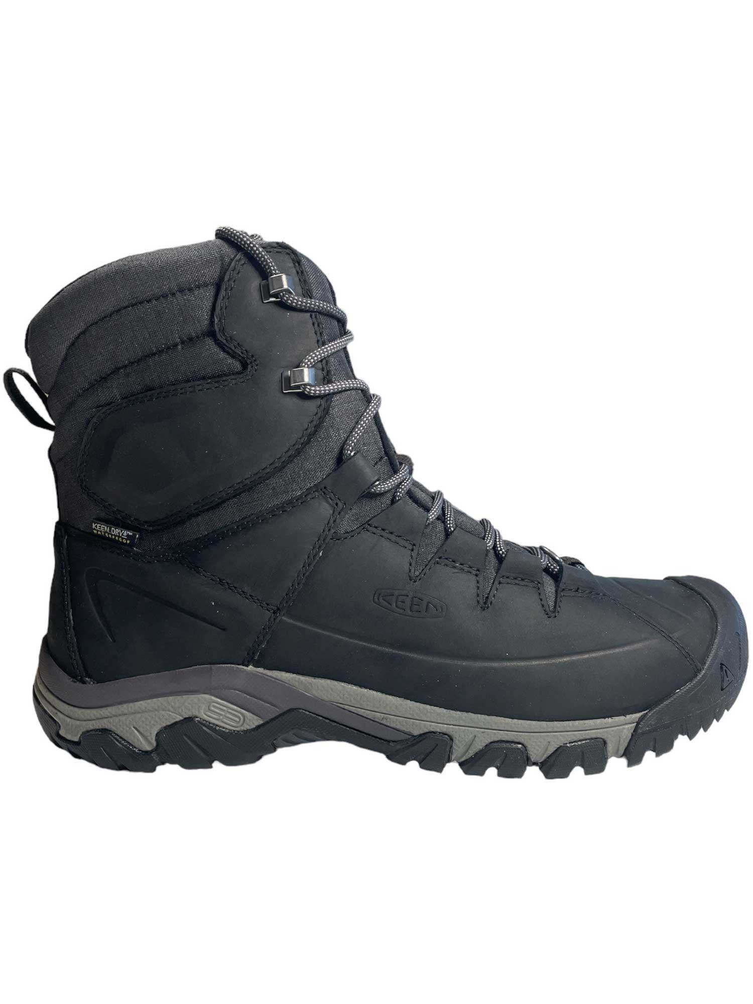 High lace waterproof boot with lace-up closure, side panels, and chunky treaded sole