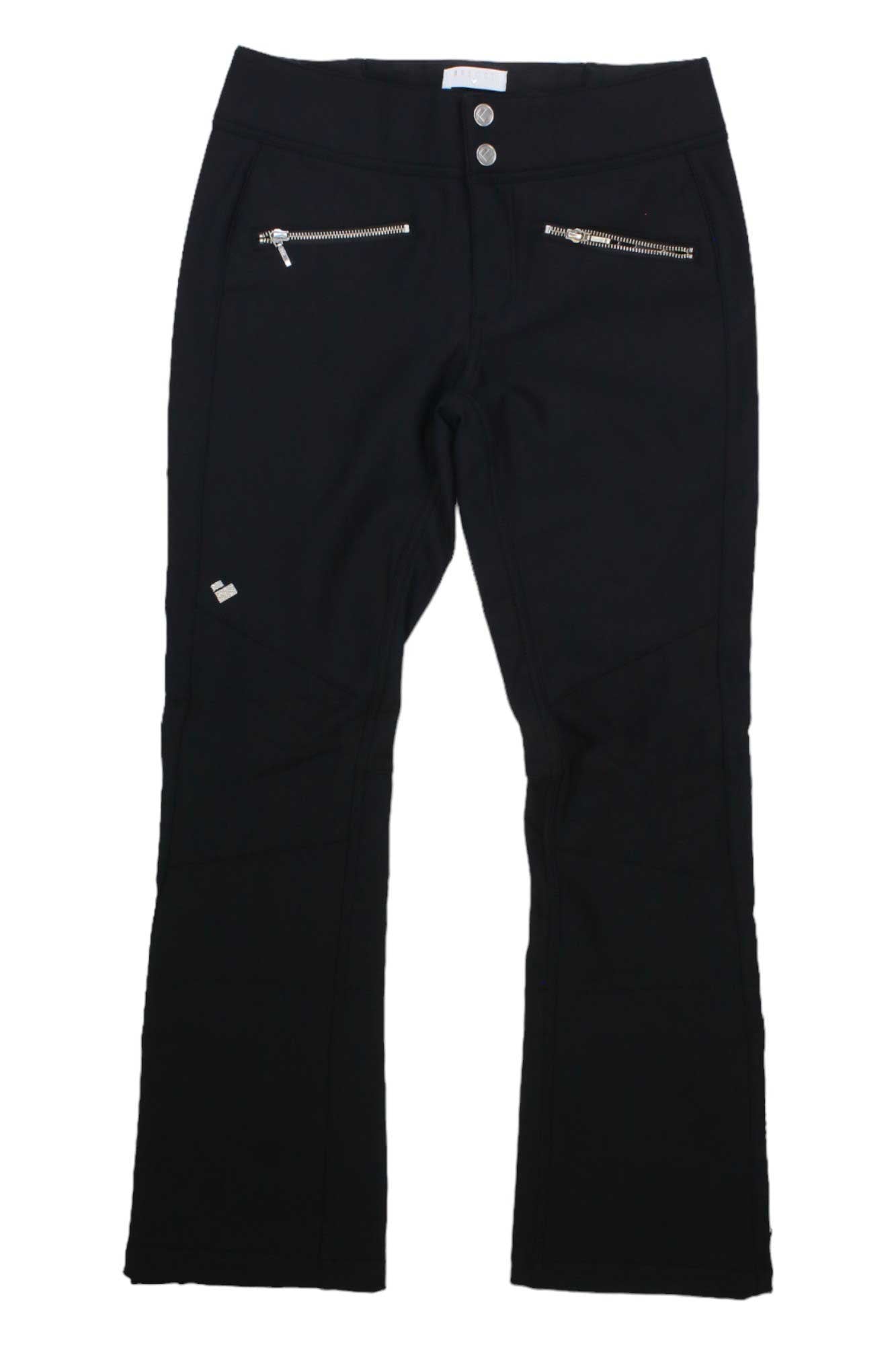 The Clio Soft-Shell Snow Pants are black women's ski pants with water-resistant fabric, two front zipper pockets, two metallic waistband buttons, a small upper-leg logo, a fitted style, and slightly flared legs.