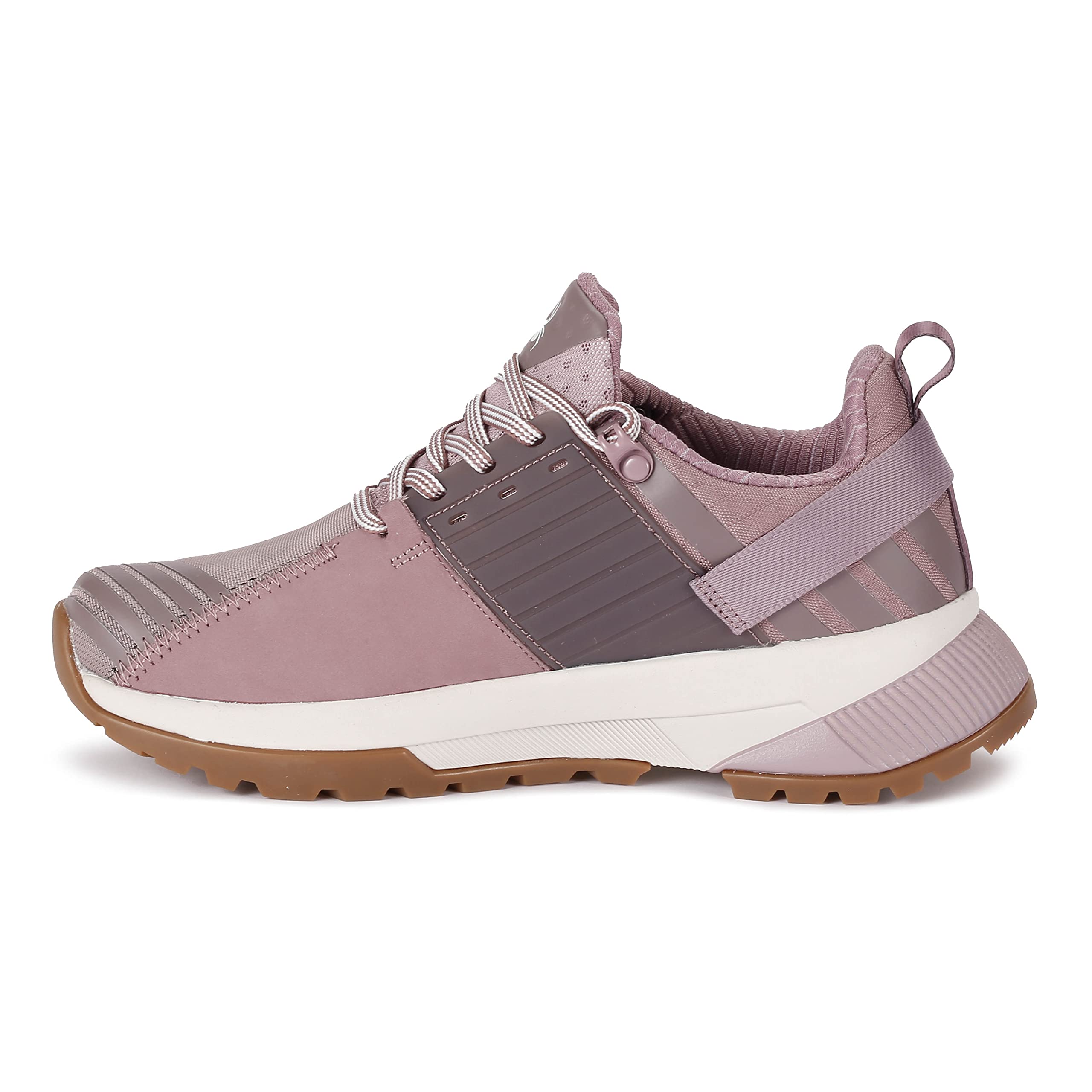 The Spyder Women's Shasta Waterproof Trail Shoe in purple features mauve and light purple tones, white laces, a white and brown Vibram sole, and textured side panels—ideal for those seeking stylish, durable waterproof trail sneakers.