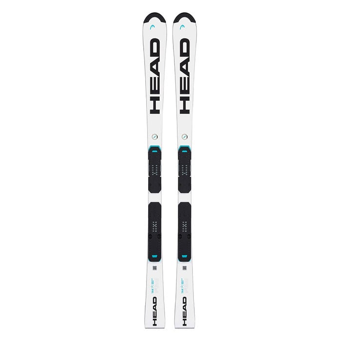 A pair of Head Junior WCR Rebel Team Skis feature black bindings, bold black HEAD logos near the tips, Worldcup SW Tech, Graphene, and light blue accents. The white skis are shown upright side by side.