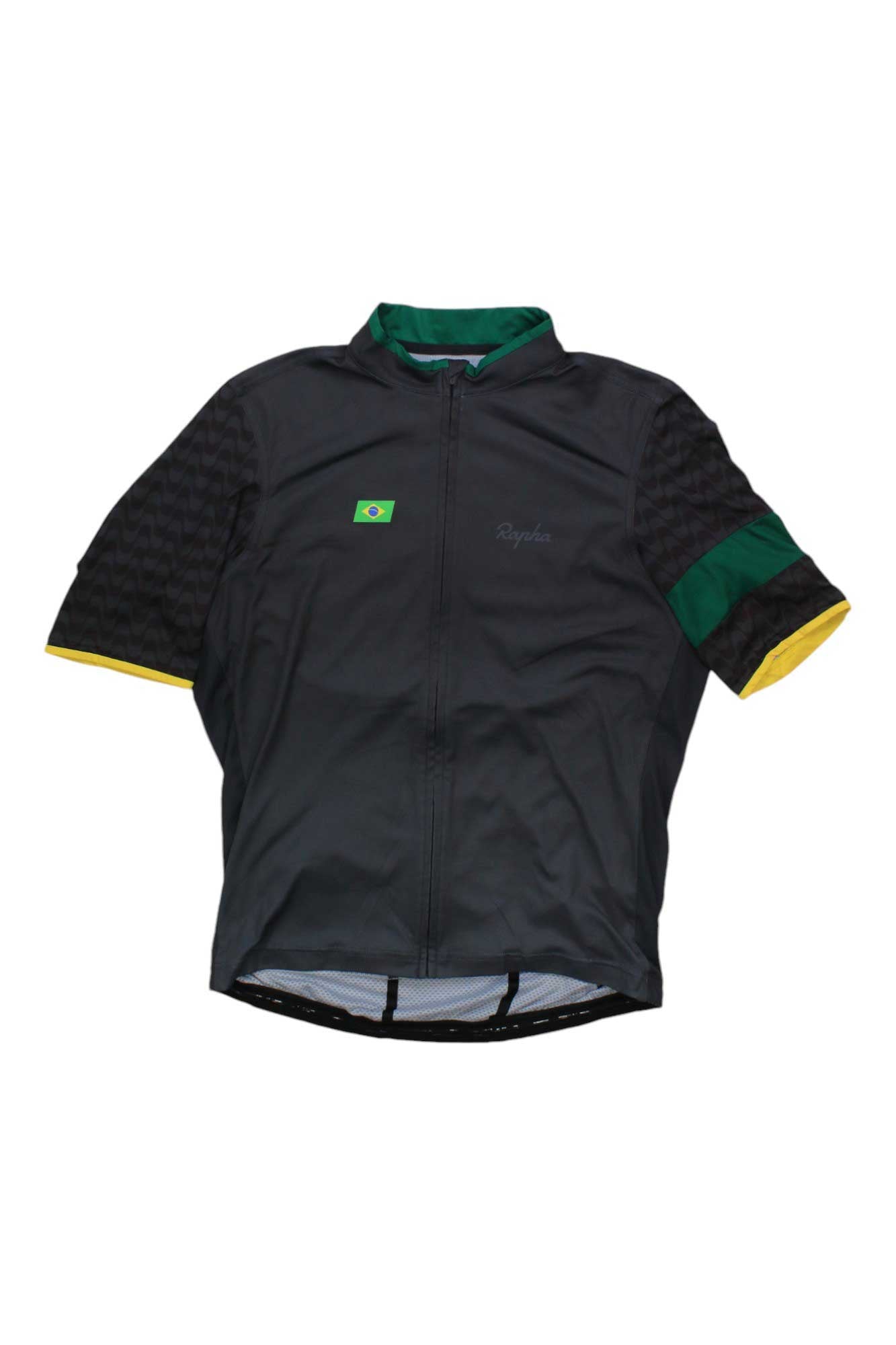 The Rapha Mens Super Lightweight Jersey is a black, short-sleeve cycling jersey with a green collar, yellow sleeve trim, a small Brazilian flag patch on the chest, subtle patterned sleeves, and a front zipper.