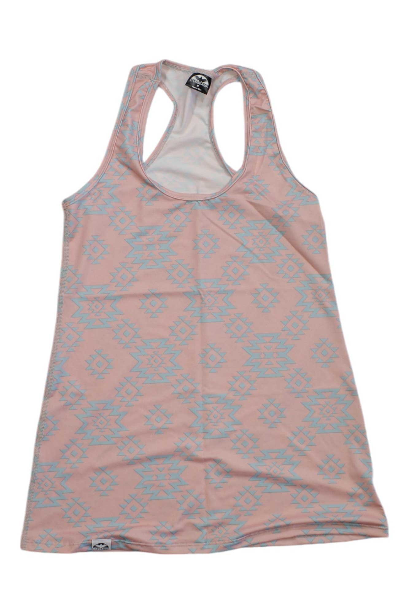 The Corbeaux Women's Racerback Tank is a light pink, UPF 50+ athletic-fit top with a light blue geometric tribal pattern, shown laid flat on a white background.