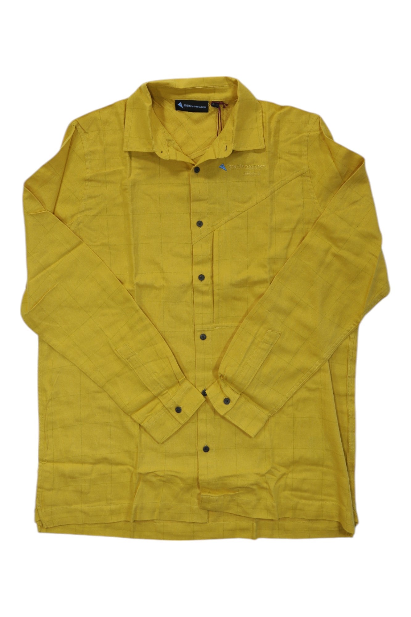 A Klattermusen Mens Helheim LS Shirt in yellow is laid flat with sleeves crossed. This outdoor shirt has a collar, black buttons, chest logo embroidery, and moisture-wicking fabric.