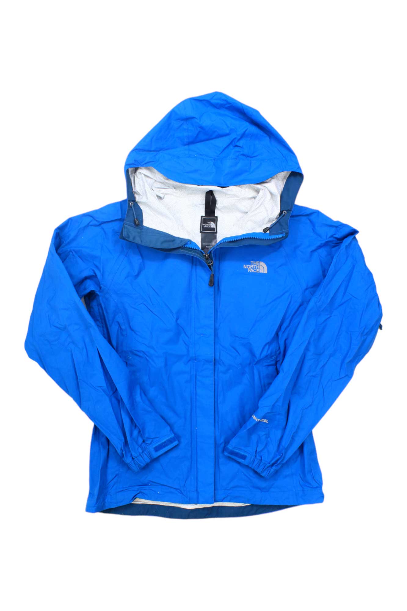 A vibrant blue Columbia Womens Venture Jacket, waterproof and breathable with a front zipper, long sleeves, and the logo on the left chest. Laid flat with the hood up, displaying its interior lining.