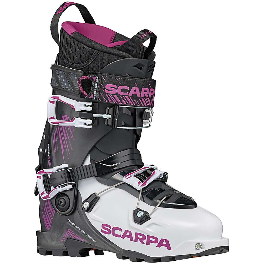 The Scarpa Womens Gea Rs Ski Boot in black, white, and pink features multiple adjustable buckles and straps, bold branding, and a rugged sole—ideal for alpine and backcountry skiing with superior performance.