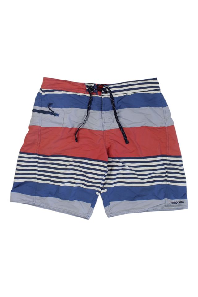 Men’s red and blue striped boardshorts with navy drawstring, mid-thigh length.