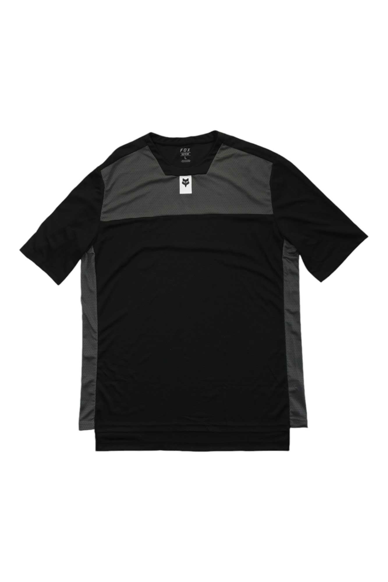 Inspired by the Fox Mens Defend SS Jersey, this short-sleeve athletic tee features a black body, dark gray panels, and a small white rectangular logo below the collar—ideal as a casual mountain bike jersey.