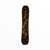 The YES All-In Snowboard 26 is a durable freestyle board with a black and brown background, bold yellow graffiti-style “YES” lettering across its length, and abstract patterns throughout.