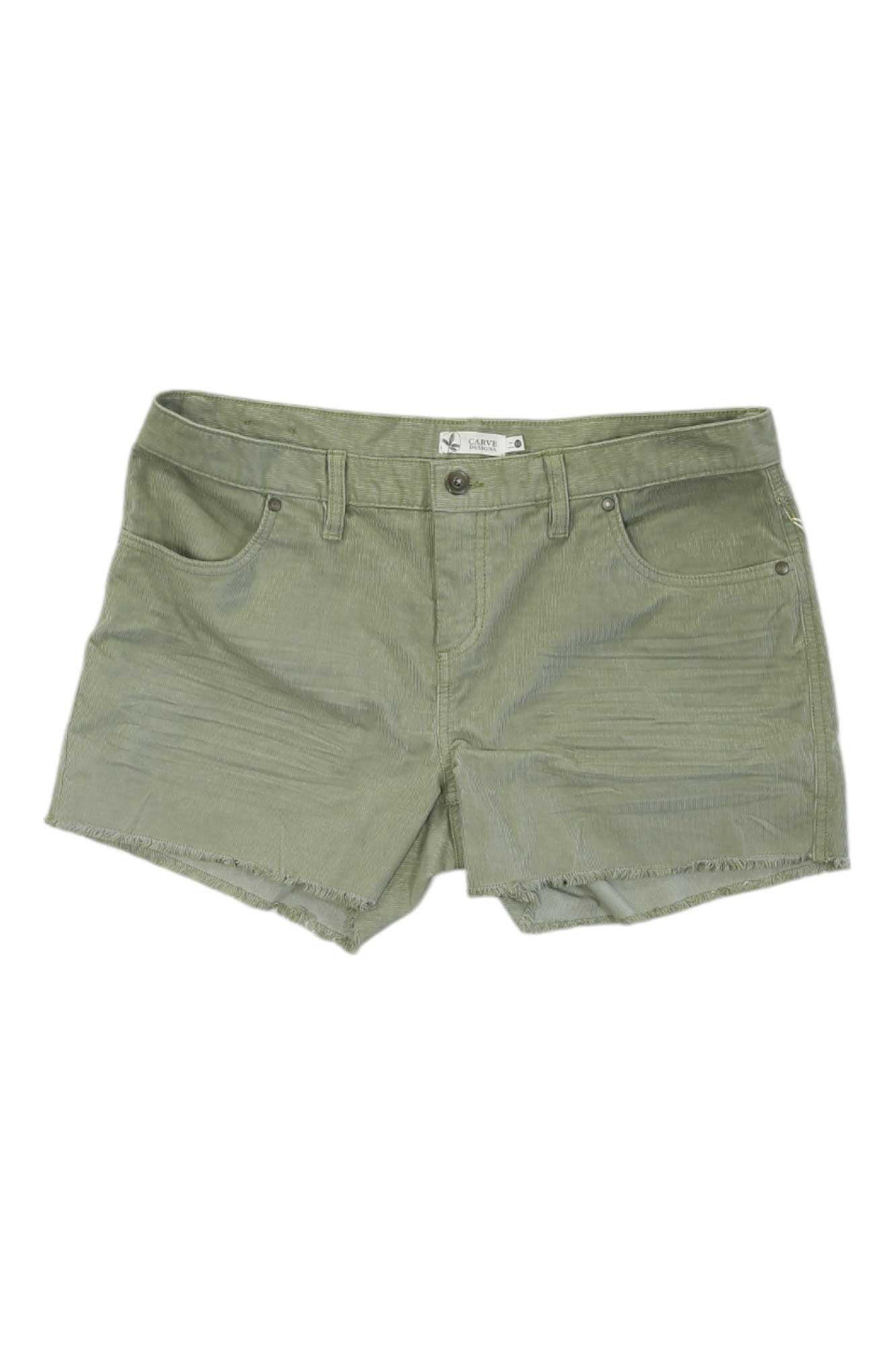 The Carve Designs Women's Oahu 4 Inch Short features olive corduroy, a slim fit, front and back pockets, belt loops, button and zipper closure, plus frayed hems—perfect for effortless style.