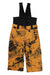 The Obermeyer Boys Warp Pant features yellow and black insulated ski pants with an abstract tire track design, adjustable black suspenders at the waist, and waterproof fabric, shown against a white background.