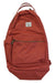 The Herschel Supply Company Nova Backpack is rust-colored, made from recycled fabric, and features a front zip pocket, laptop sleeve, small white brand label, and top handle.