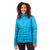 A woman with curly hair smiles while wearing the Moosejaw Womens Cozy Down Insulator Jacket in bright blue and black pants, standing against a plain white background.
