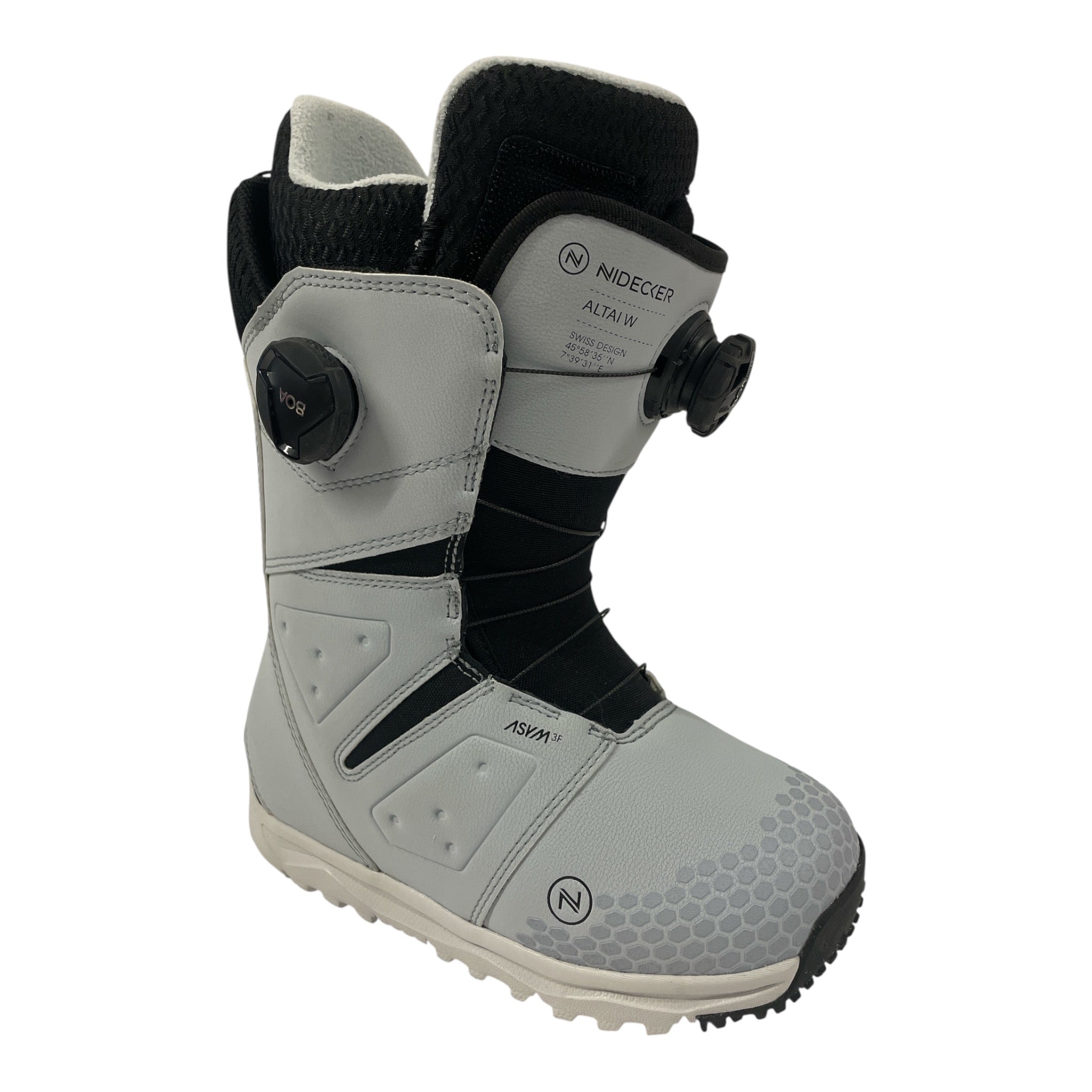 The Nidecker Altai Womens Double Boa Cloud Snowboard Boot is a gray women's boot with black accents, Dual-Dial BOA laces, textured sole, reinforced support panels, mid-stiff flex, and Nidecker Altai W branding on the side.