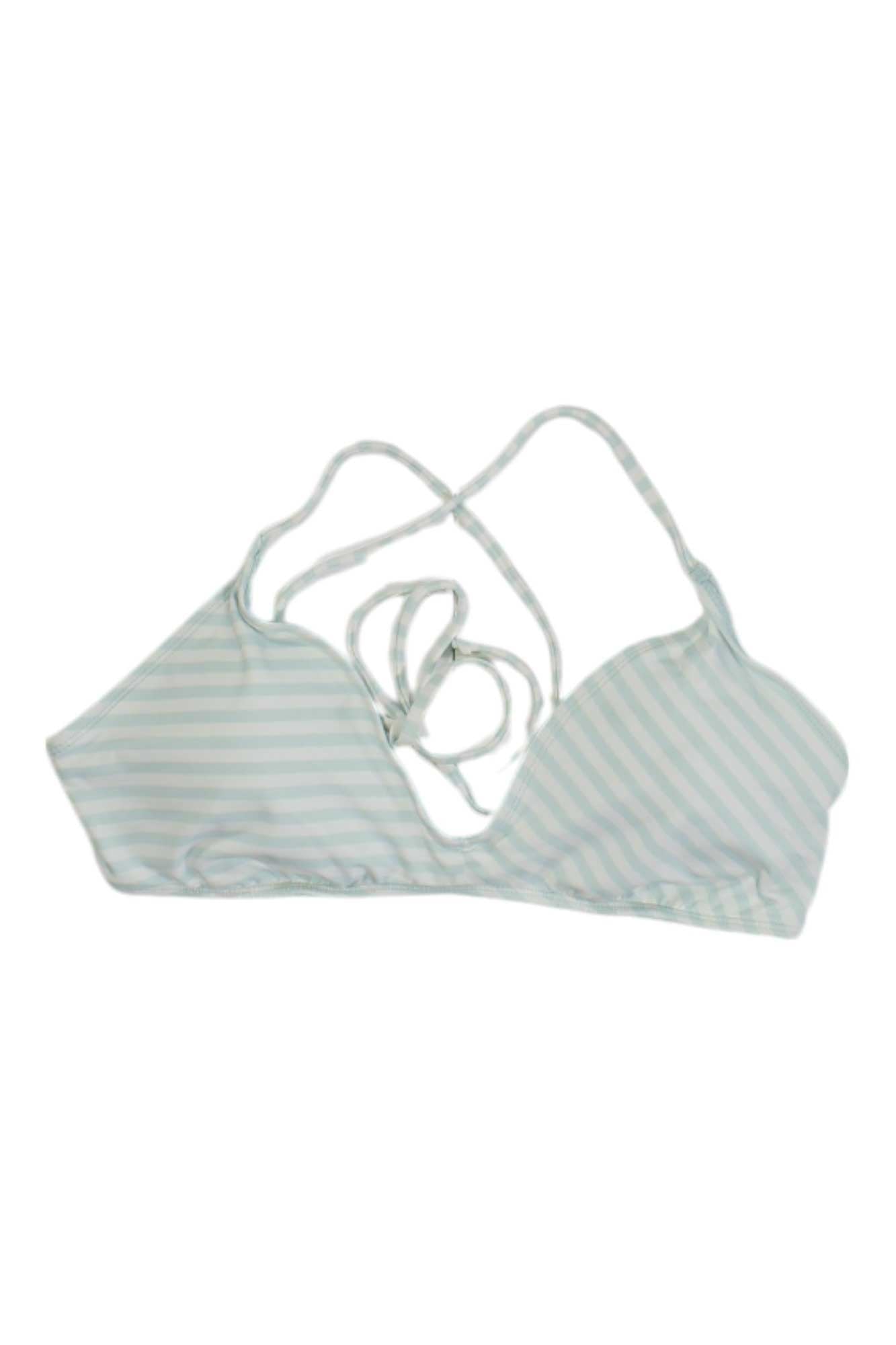 The Carve Designs Women's Tamarindo Top is a light blue and white striped swim top with string ties, laid flat on a white background. Made from recycled materials for an eco-friendly touch.