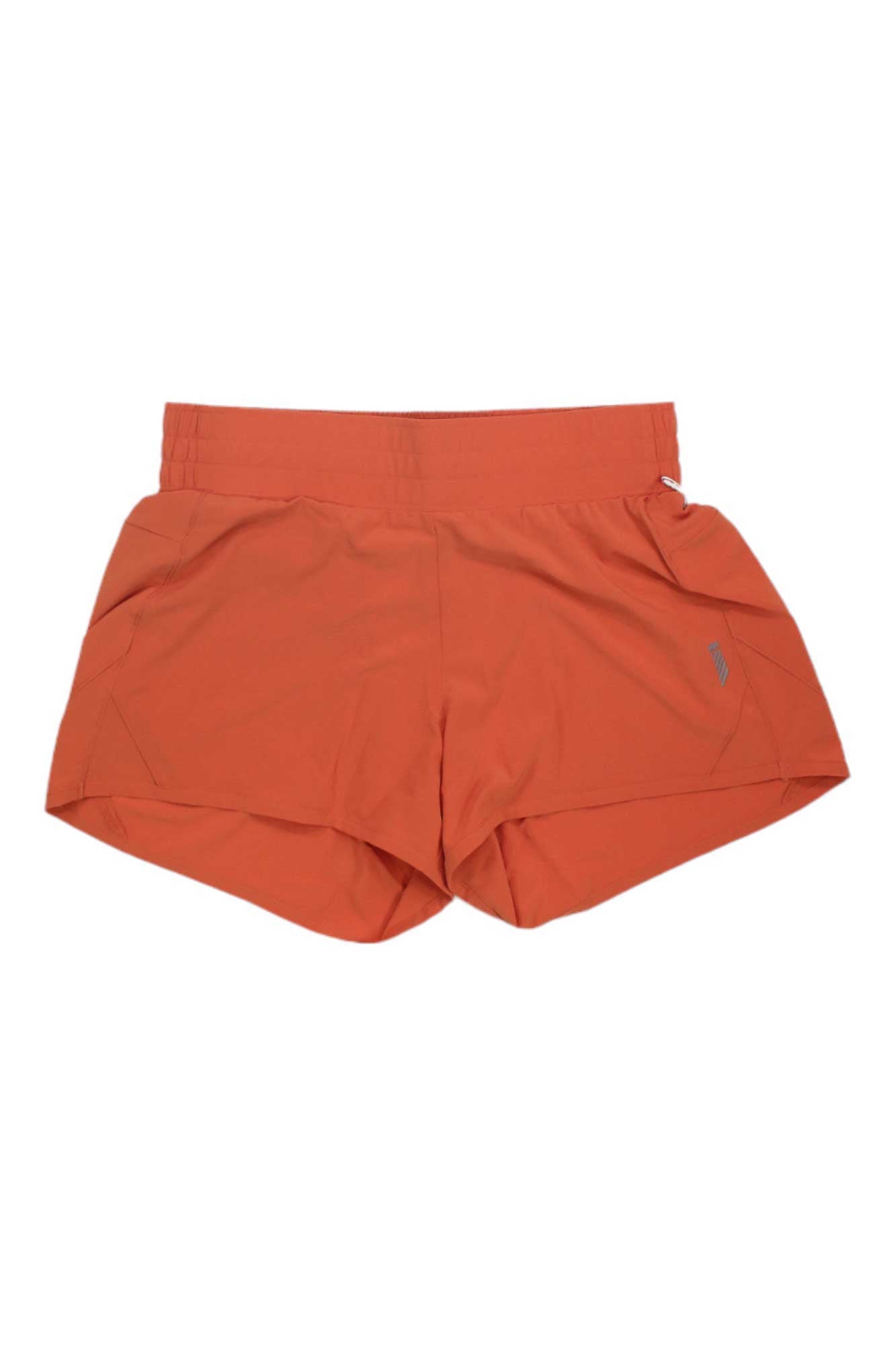 Helly Hansen Womens Tech Trail Short in orange features a wide waistband and slightly flared legs, shown flat on a white background. Lightweight material with UPF 50 protection is ideal for hiking, sports, or casual wear.