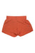 Helly Hansen Womens Tech Trail Short in orange features a wide waistband and slightly flared legs, shown flat on a white background. Lightweight material with UPF 50 protection is ideal for hiking, sports, or casual wear.