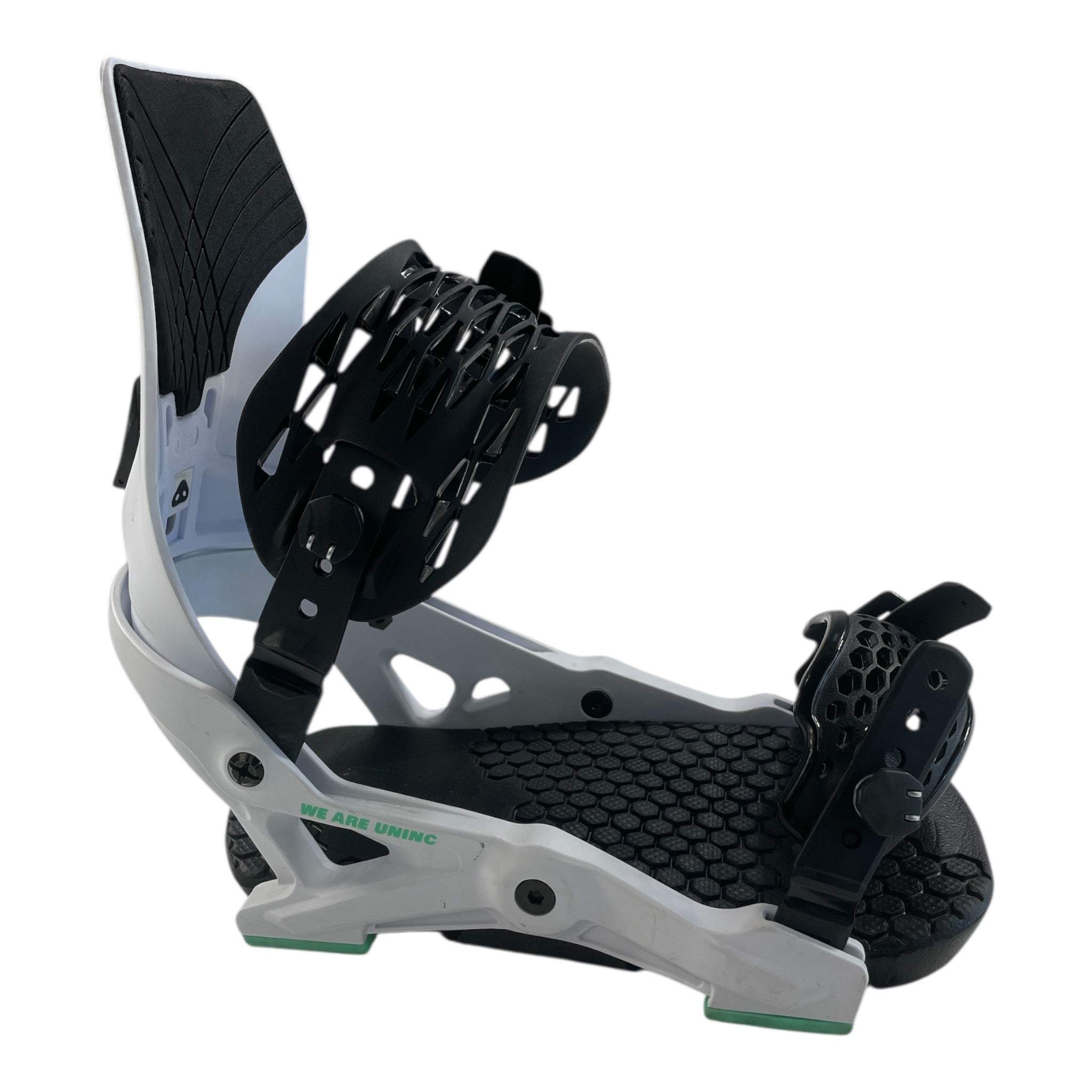 Close-up of YES Rebel Snowboard Bindings with a white base, black straps, and green details, designed for responsiveness and boot security on a snowboard. Displayed against a plain white background.