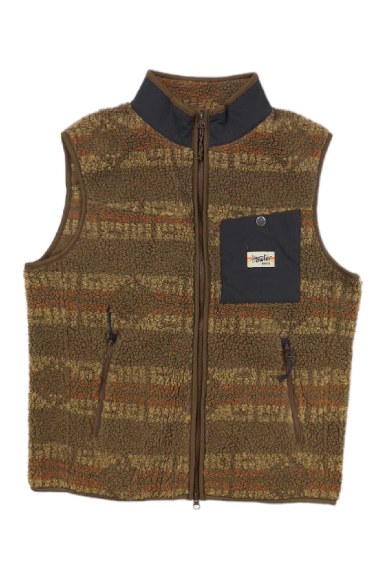 The Howler Brothers Men's Chisos Fleece Vest features a brown and tan pattern, front zipper, two zippered side pockets, black chest pocket with Hustler logo patch, high collar, and sleeveless design—ideal for outdoor adventures.