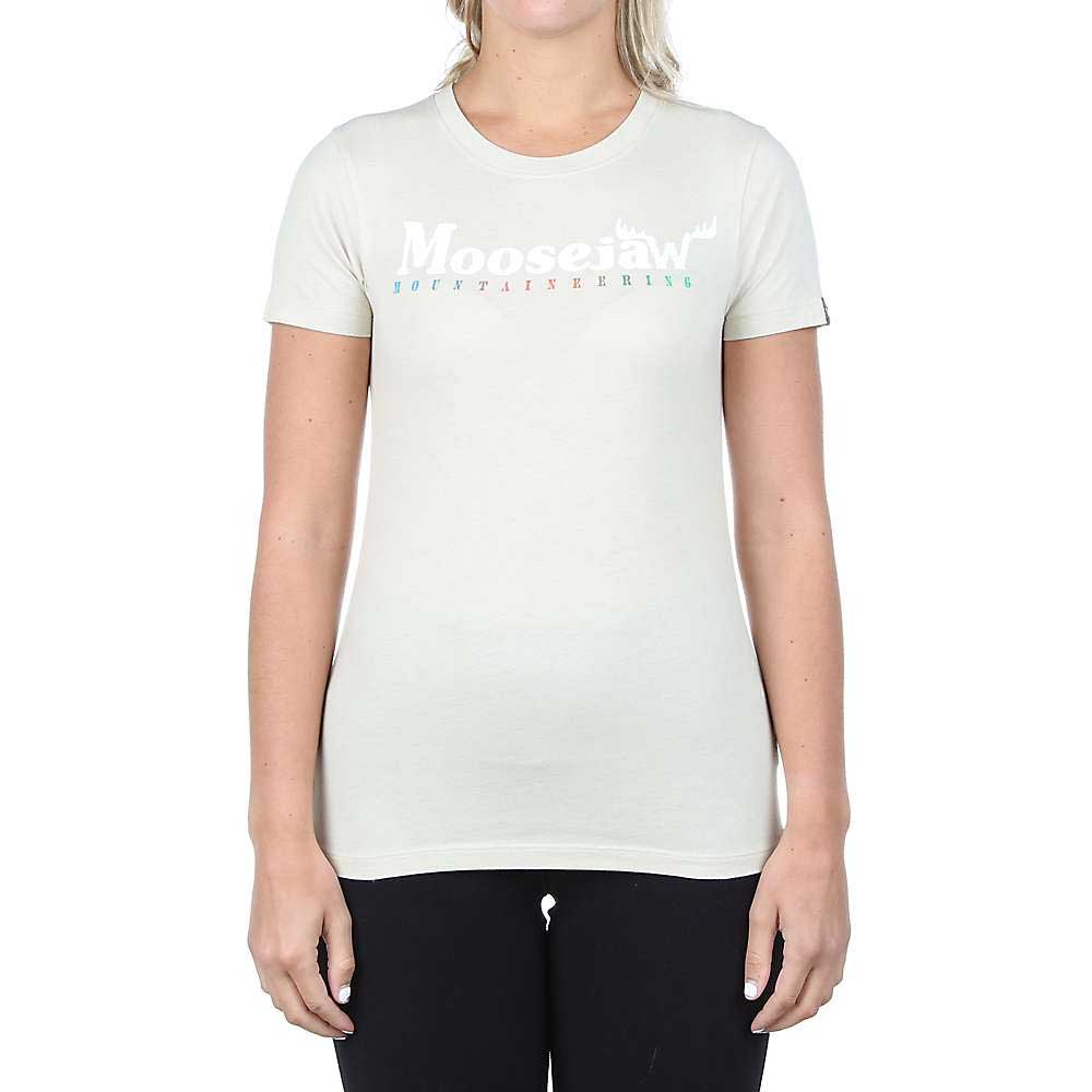 A woman wears the Moosejaw Womens New Original SS Tee, a casual short sleeve shirt featuring the Moosejaw Mountaineering logo, standing against a plain white background.
