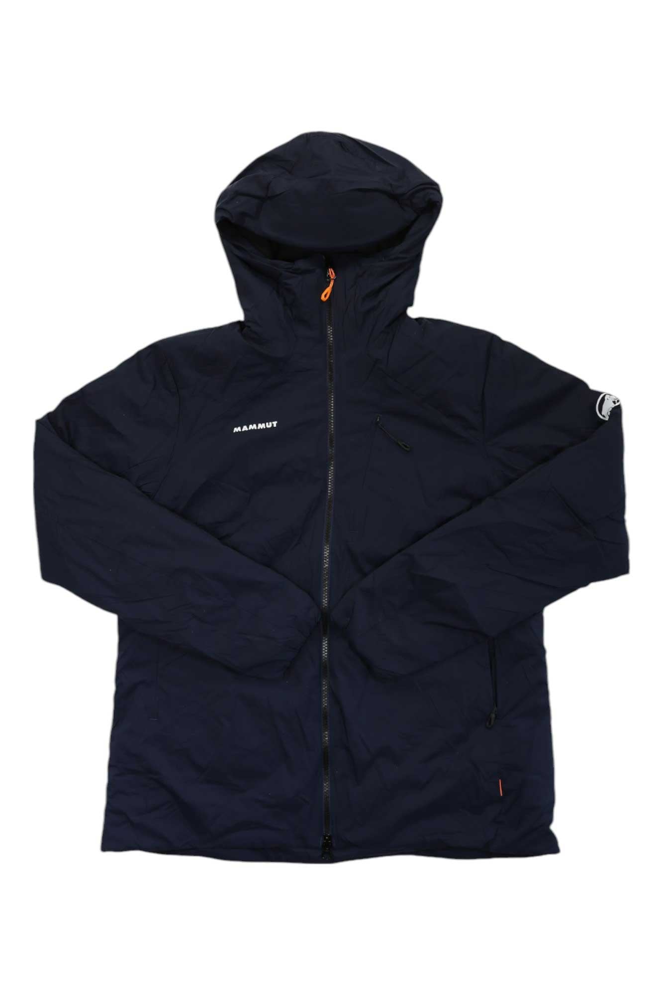 The Mammut Womens Rime IN Flex Hooded Jacket is a dark navy, lightweight insulated jacket with water repellent finish, front zipper, long sleeves, small logo text on left chest and sleeve, helmet-compatible hood, and orange zipper accents.