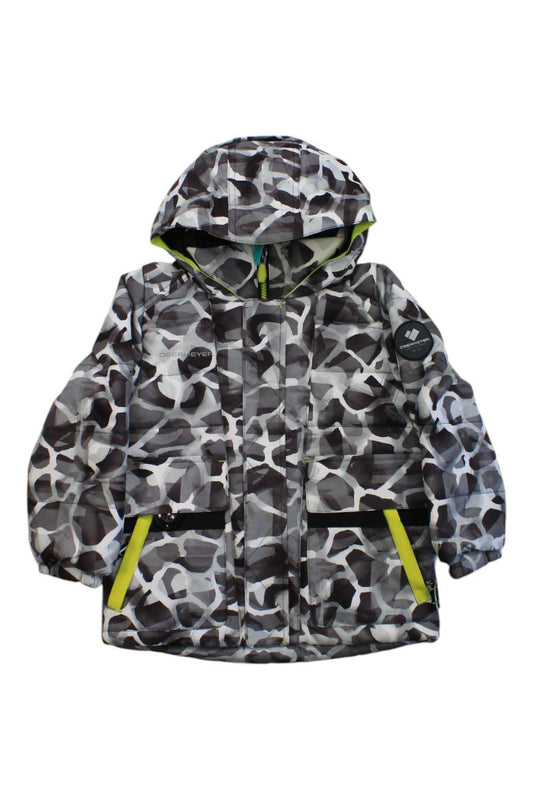 The Obermeyer Boys M-Way Jacket is an insulated ski jacket with HydroBlock Sport fabric, a black/white/gray camo print, yellow zipper accents, two front pockets, and a circular patch on the left sleeve.