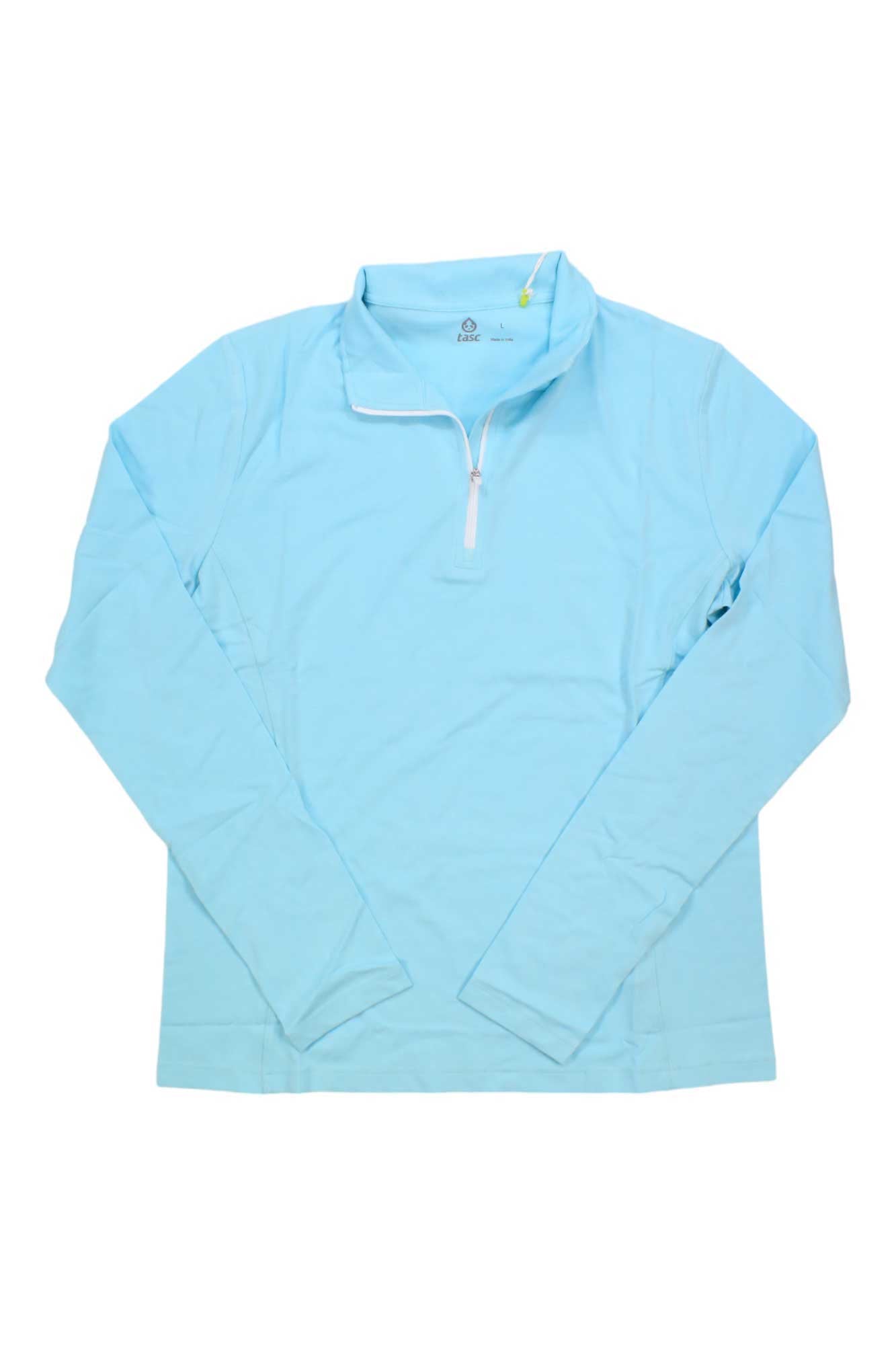 The Tasc Womens Recess 1/4 Zip Top in light blue organic cotton features a stand-up collar and long sleeves, shown laid flat on a white background.