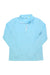 The Tasc Womens Recess 1/4 Zip Top in light blue organic cotton features a stand-up collar and long sleeves, shown laid flat on a white background.