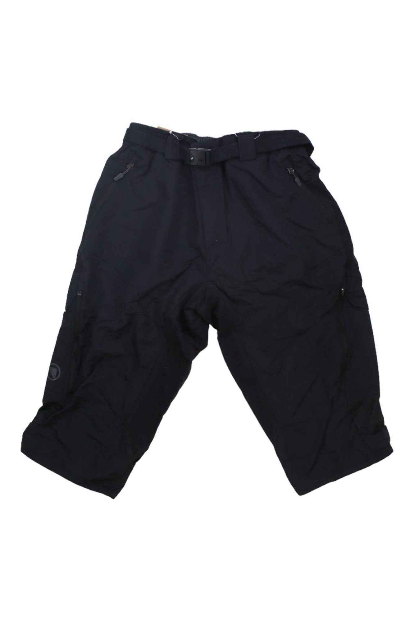 Endura Mens Hummvee 3/4 Short in black nylon ripstop features multiple zippered pockets and a built-in belt, shown laid flat on a white background.